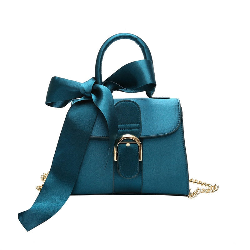 Women's velvet bow top-handle chain bag in black, blue, brown or pink