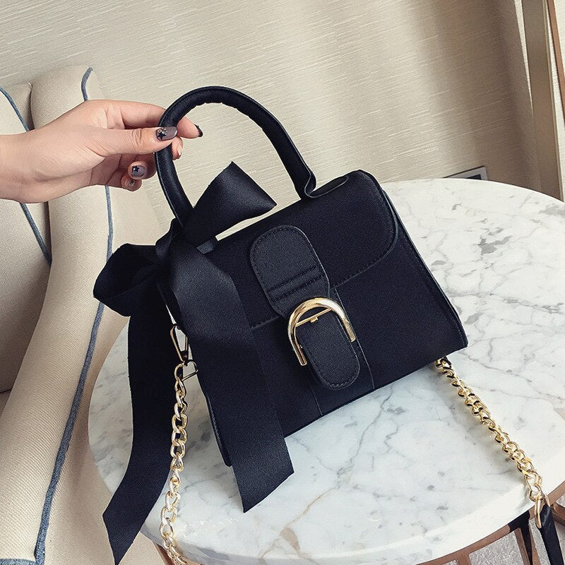 Women's velvet bow top-handle chain bag in black, blue, brown or pink