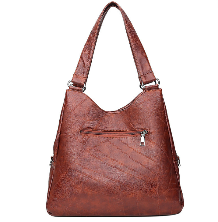 Women's vintage-style top-handle shoulder bag in black or brown