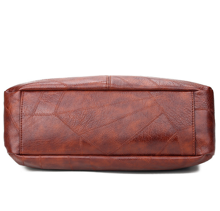 Women's vintage-style top-handle shoulder bag in black or brown