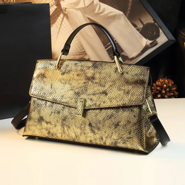 Women's snake print PU shoulder bag in gold or dark pink