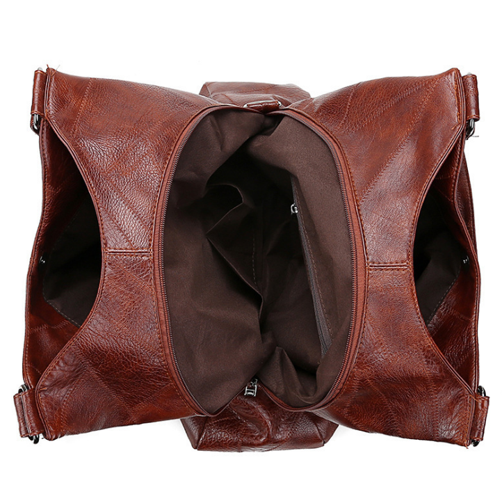 Women's vintage-style top-handle shoulder bag in black or brown