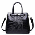 Women's structured PU shoulder bag with hasp closure in black, purple or red