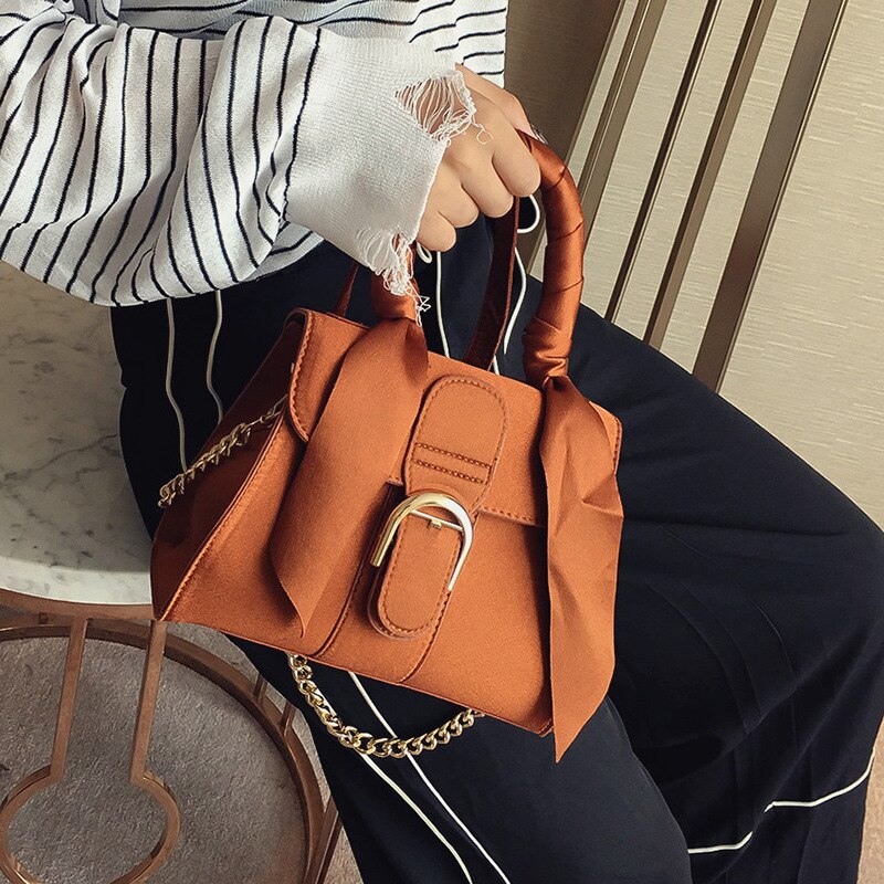 Women's velvet bow top-handle chain bag in black, blue, brown or pink