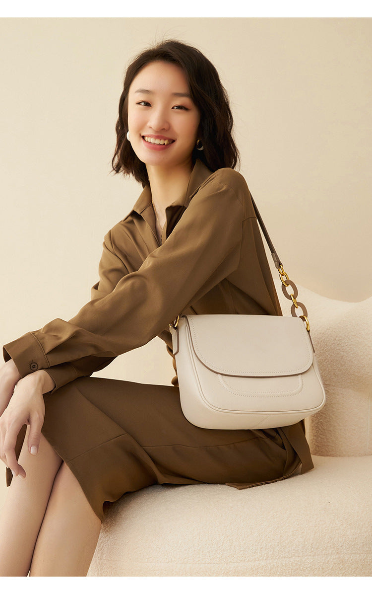 Women's cowhide leather saddle bag in blue, white or yellow