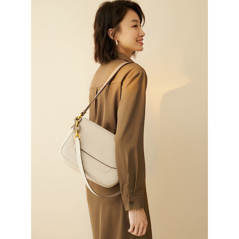 Women's cowhide leather saddle bag in blue, white or yellow