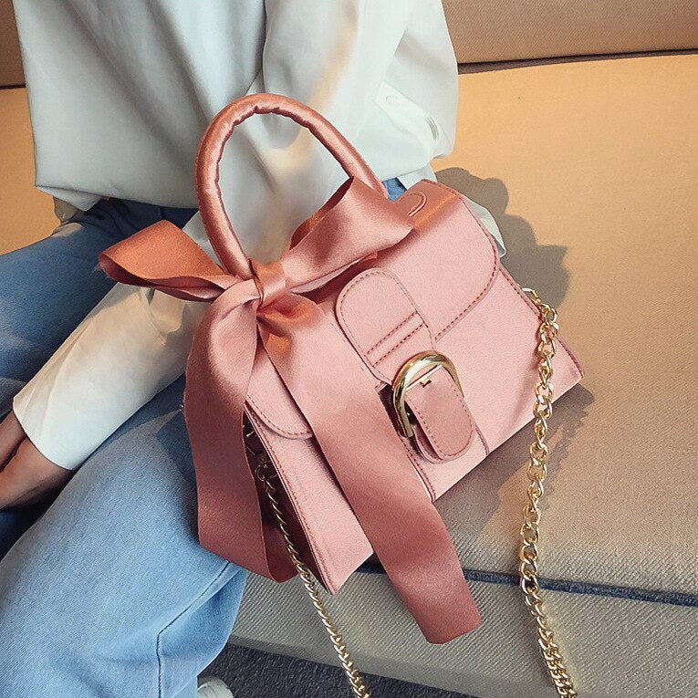 Women's velvet bow top-handle chain bag in black, blue, brown or pink