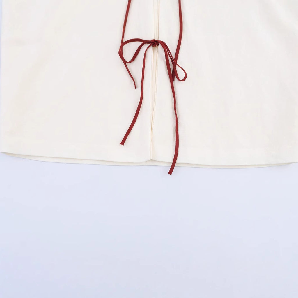 Relaxed off-white embroidered kimono-style layer