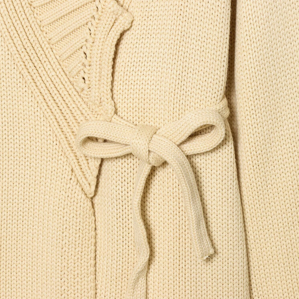 Belted off-white layering jacket with kimono silhouette
