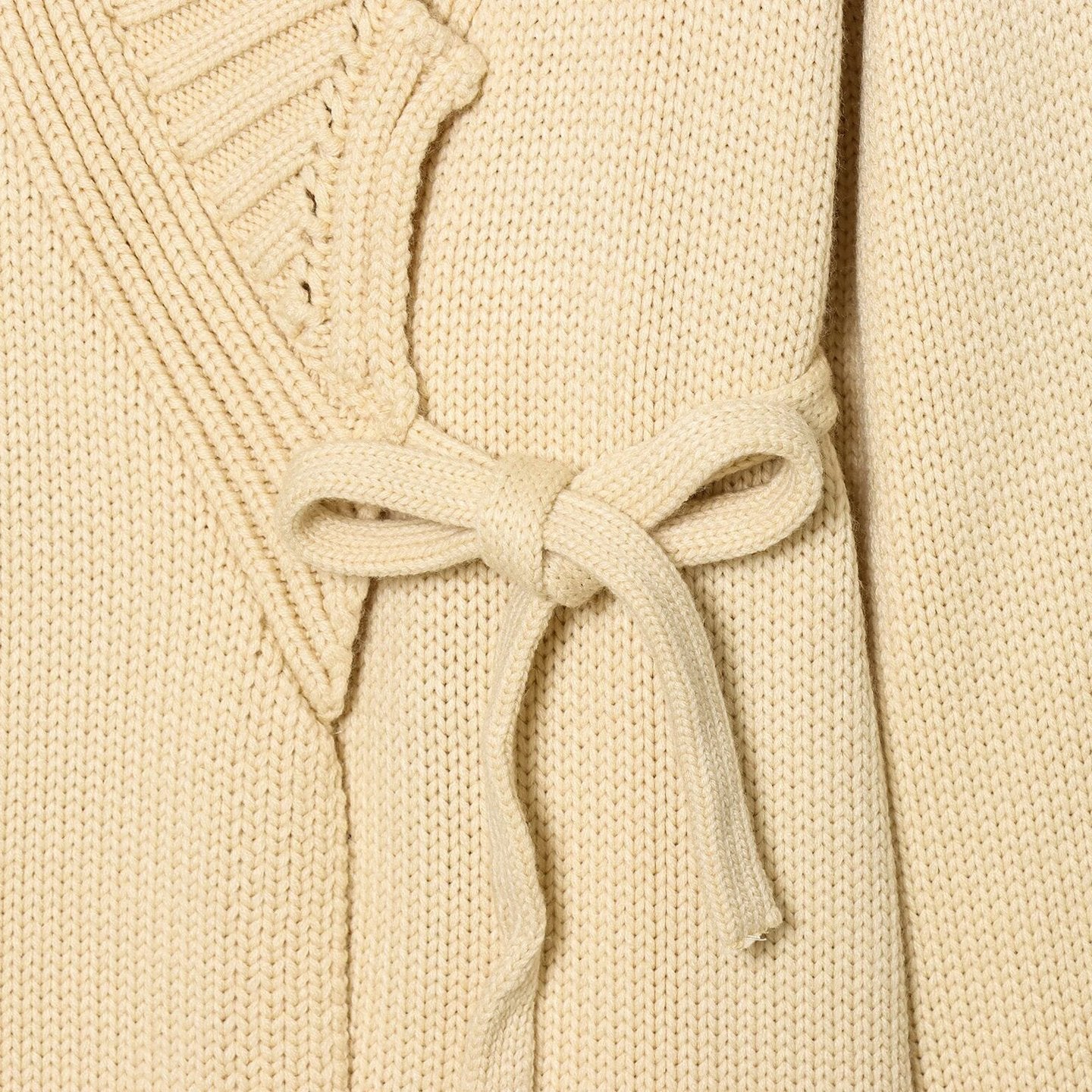 Belted off-white layering jacket with kimono silhouette