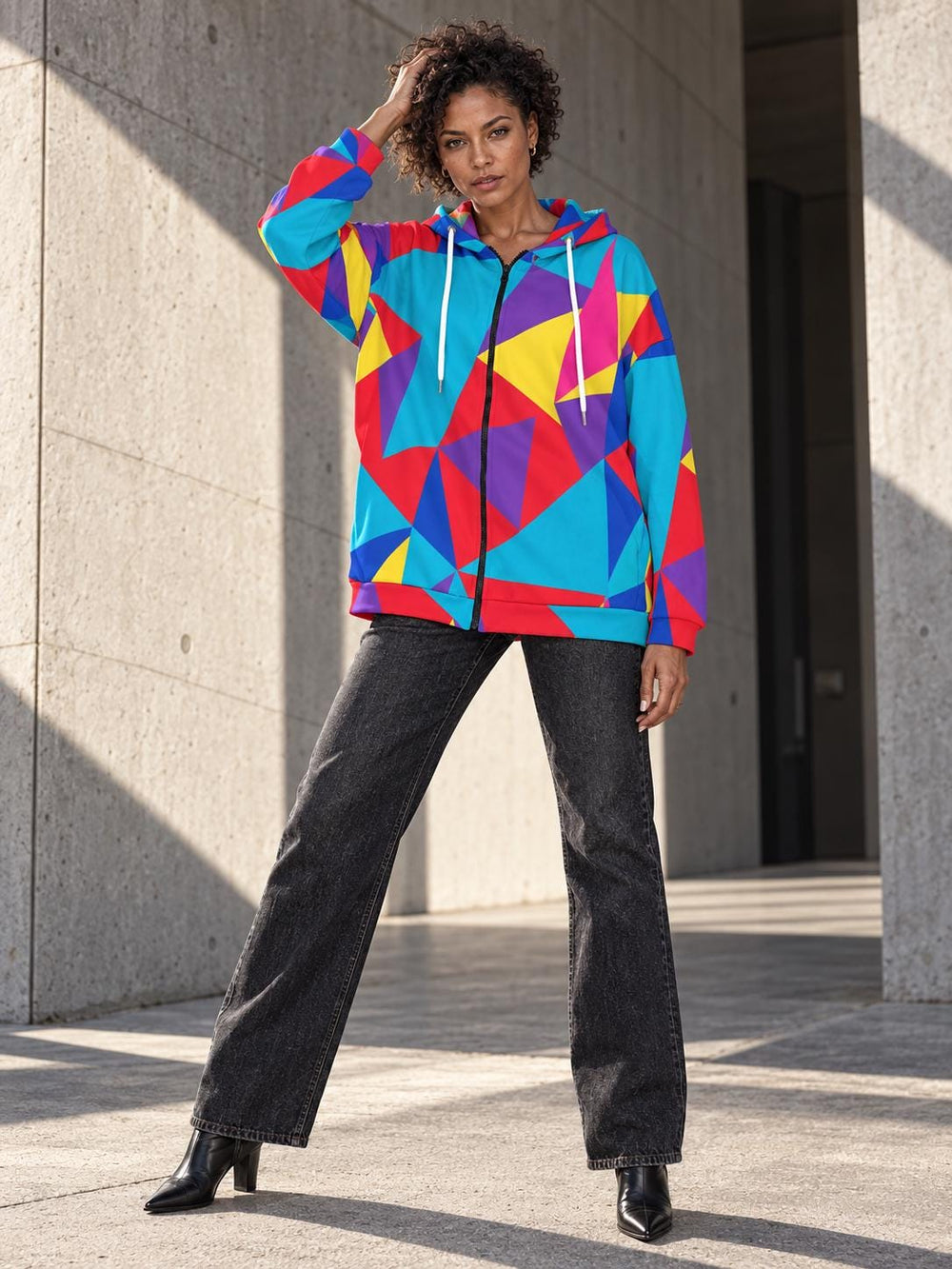 Bright geometric pink blue yellow colorblock longline zip hoodie on model