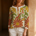 Groovy Floral Blouse, Retro Orange Green Flower Print Lace Trim Top | front view