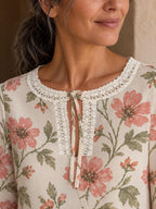 Romantic Pink Floral Blouse with Lace Trim, Cream Tie Neck Long Sleeve Top - editorial photo 5