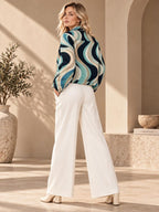 Women’s Retro Wave Fleece Jacket teal and beige styling view